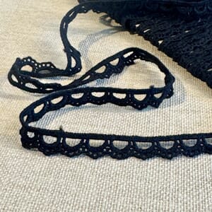 Papirdesign - Sort blonde, bredde 10 mm, selges pr m